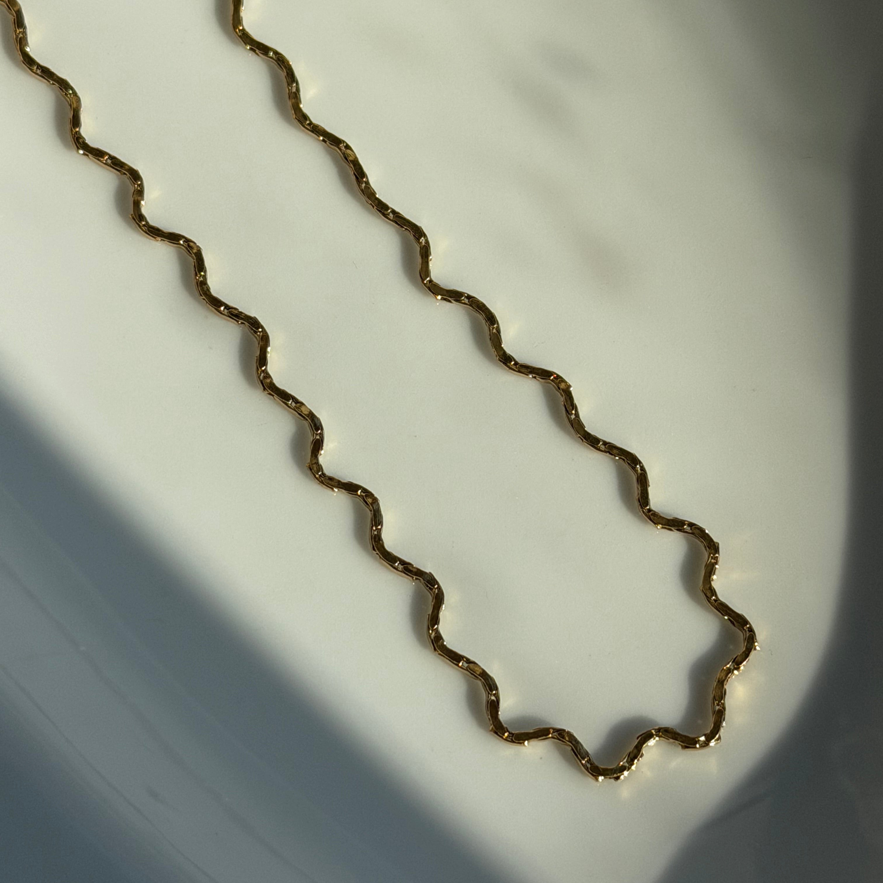 Gold chain on a white background