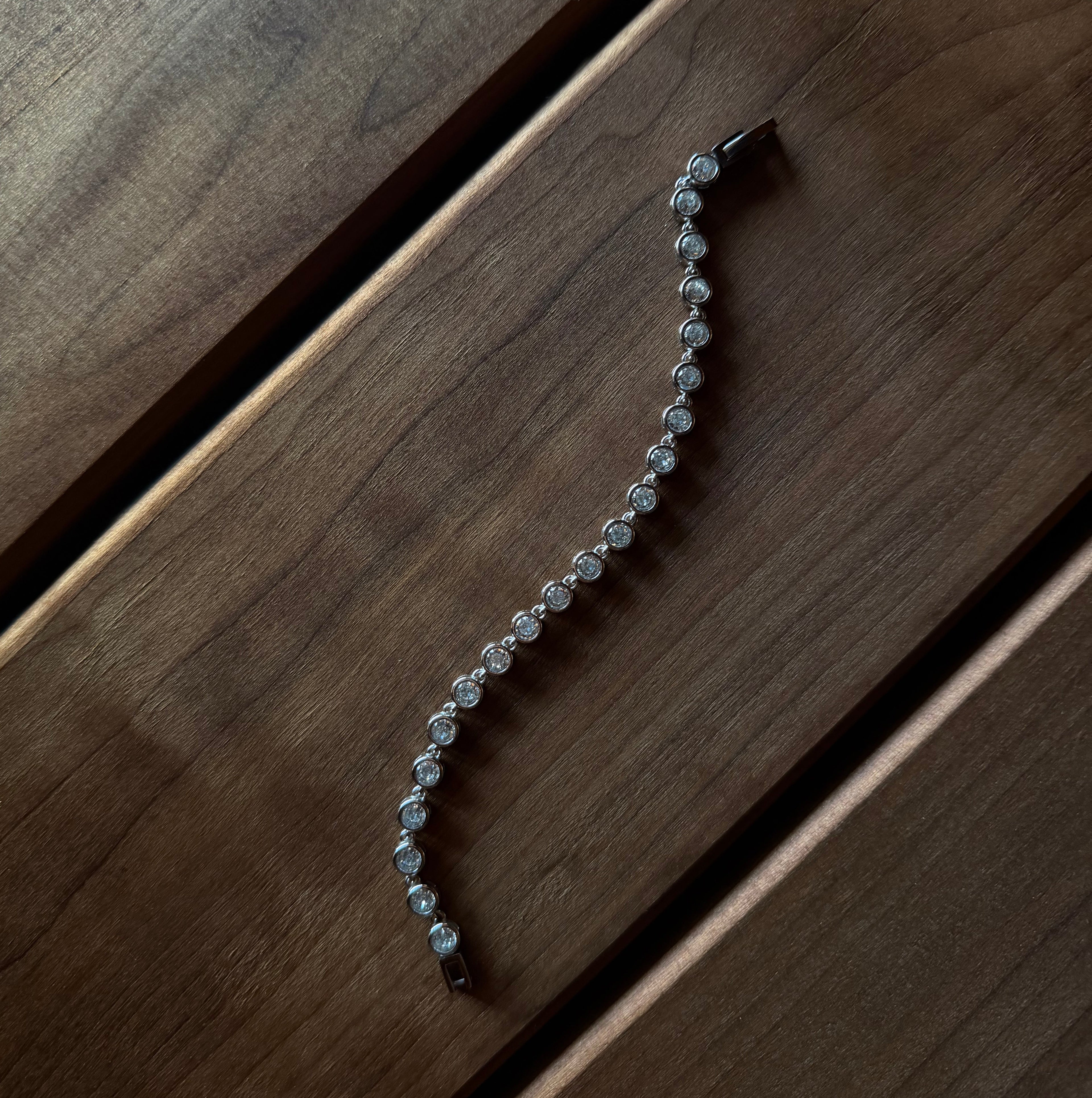 Tennis Bracelet on a wooden surface